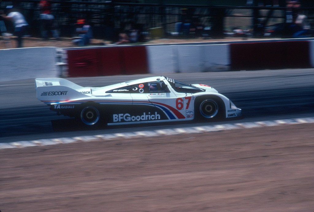 #67_Jim Busby Porsche 962_approaching turn 6_Riverside Raceway_April 1985 #67_Jim Busby Porsche 962_approaching turn 6_Riverside Raceway_April 1985