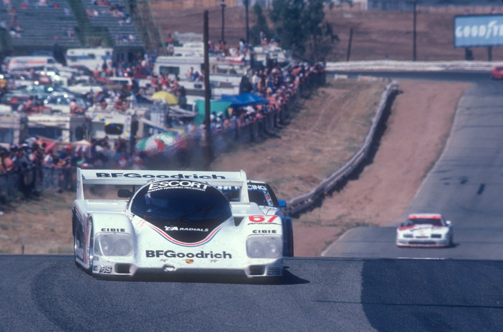 #67 BFGoodrich Porsche 962_Rick Knoop,approach to turn 7_Riverside Raceway_April 25, 1985 #67 BFGoodrich Porsche 962_Rick Knoop,approach to turn 7_Riverside Raceway_April 25, 1985