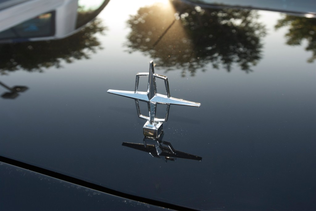 Black Lincoln Continental_ hood emblem_Cars&Coffee/Irvine_12/31/11