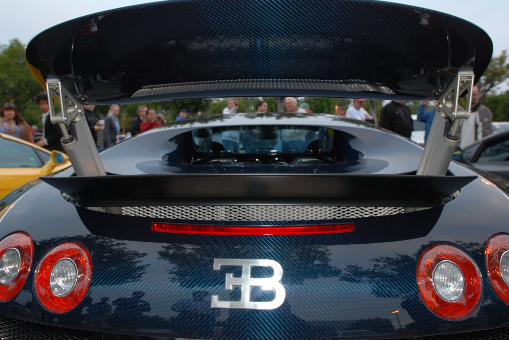 Dark blue tinted carbon fiber Bugatti Veyron Super Sport_rear view & wing details_Cars&Coffee/Irvine_2/25/12 Dark blue tinted carbon fiber Bugatti Veyron Super Sport_rear view & wing details_Cars&Coffee/Irvine_2/25/12