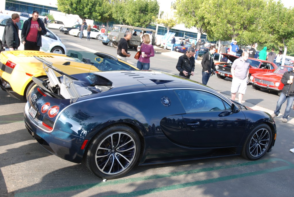 Dark blue tinted carbon fiber Bugatti Veyron Super Sport_fully extended rear wing_Cars&Coffee/Irvine_2/25/12 Dark blue tinted carbon fiber Bugatti Veyron Super Sport_fully extended rear wing_Cars&Coffee/Irvine_2/25/12