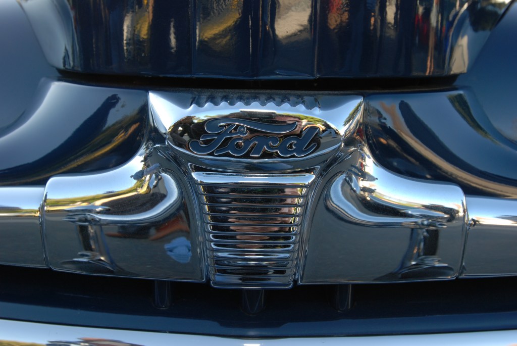 Blue Ford woody wagon_ front grill emblem reflections_Cars&Coffee/Irvine_3/10/12