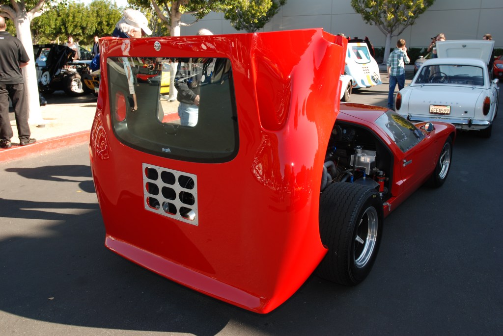 Red Ford GT with black center wheels_3/4 rear view with opened rear deck_Cars&Coffee/Irvine_3/3/12
