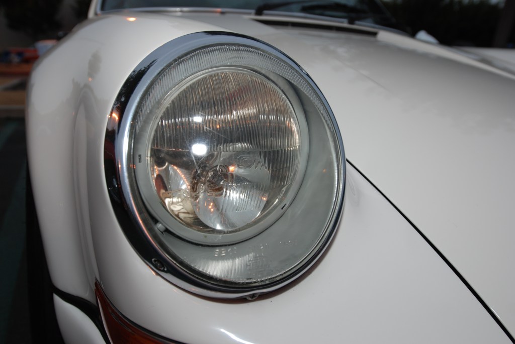 White, modified 1970's vintage Porsche 911_flared fenders_w/rare Cibie Biode headlight_Cars&Coffee/Irvine_3/31/12