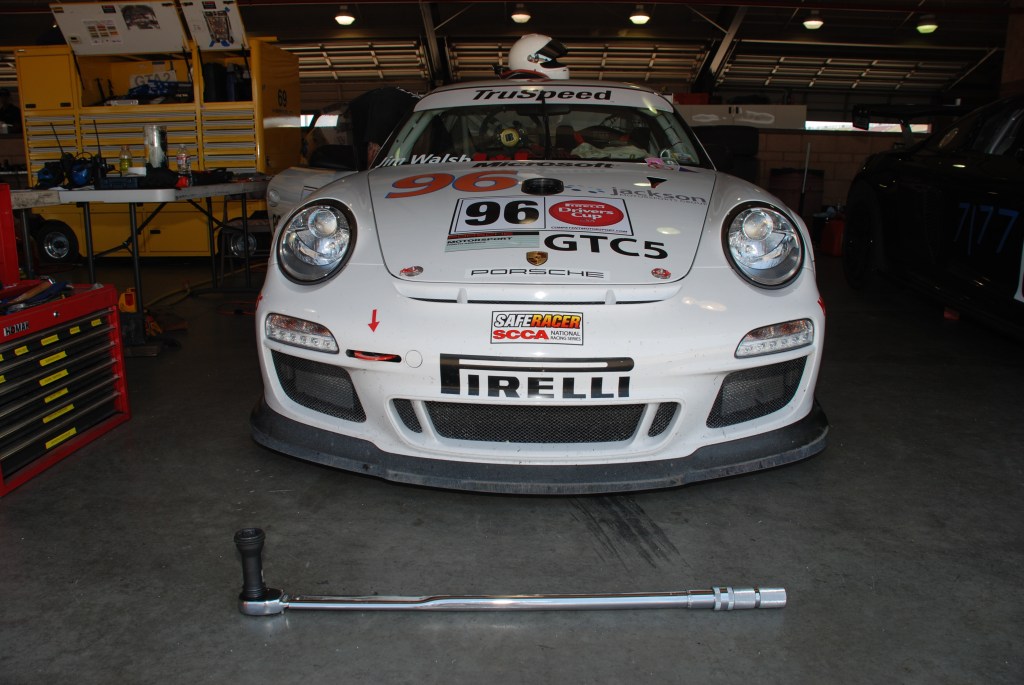 White 2012 Porsche GT3 Cup car #96_ front view with torque wrench_Festival of Speed_Auto Club Speedway_April 21, 2012