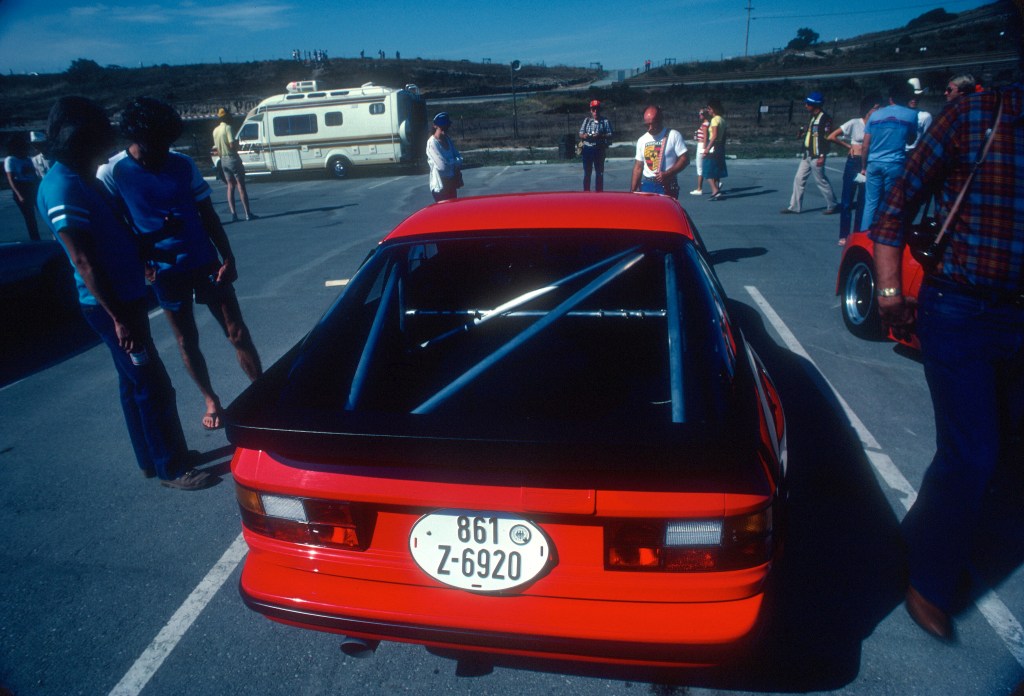 Red Porsche 924 Carrera GTS Club Sport_rear view_Monterey Historics _Laguna Seca_Aug 82