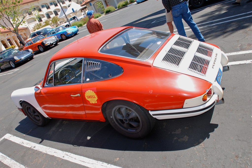 Red 1966 Porsche 911_dual rear grill deck lid_3/4 rear view_RGruppe Solvang Treffen _May 5, 2012 