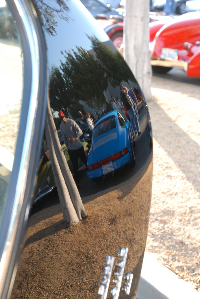 Black Jaguar E Type coupe _rear hatch w/blur Porsche 911 reflection_Cars&Coffee/Irvine_April 28, 2012