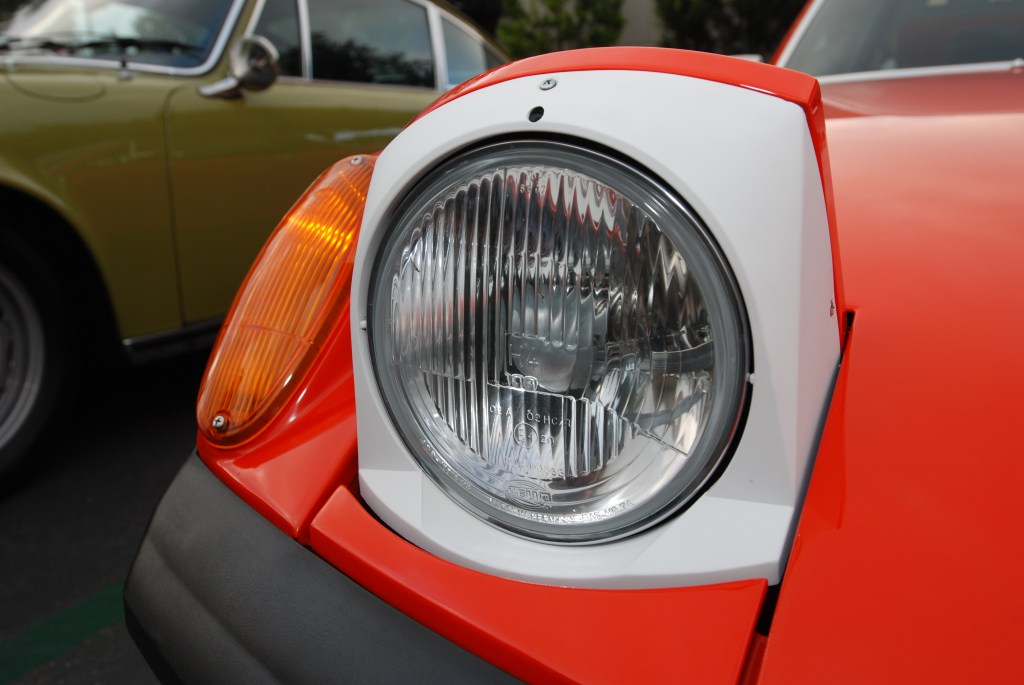 Orange 1970 Porsche 914-6_front headlight with white trim bezel_Cars&Coffee_May 26, 2012