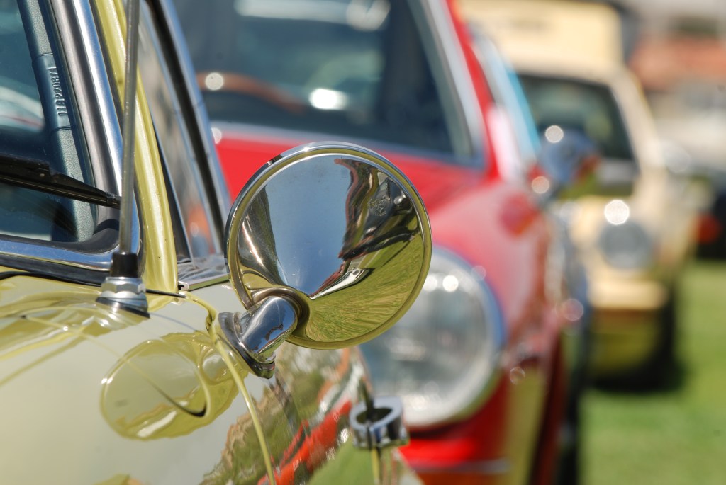356 Registry_ pea soup green Porsche with reflections in side mirror _Dana Point concours _July 15, 2012