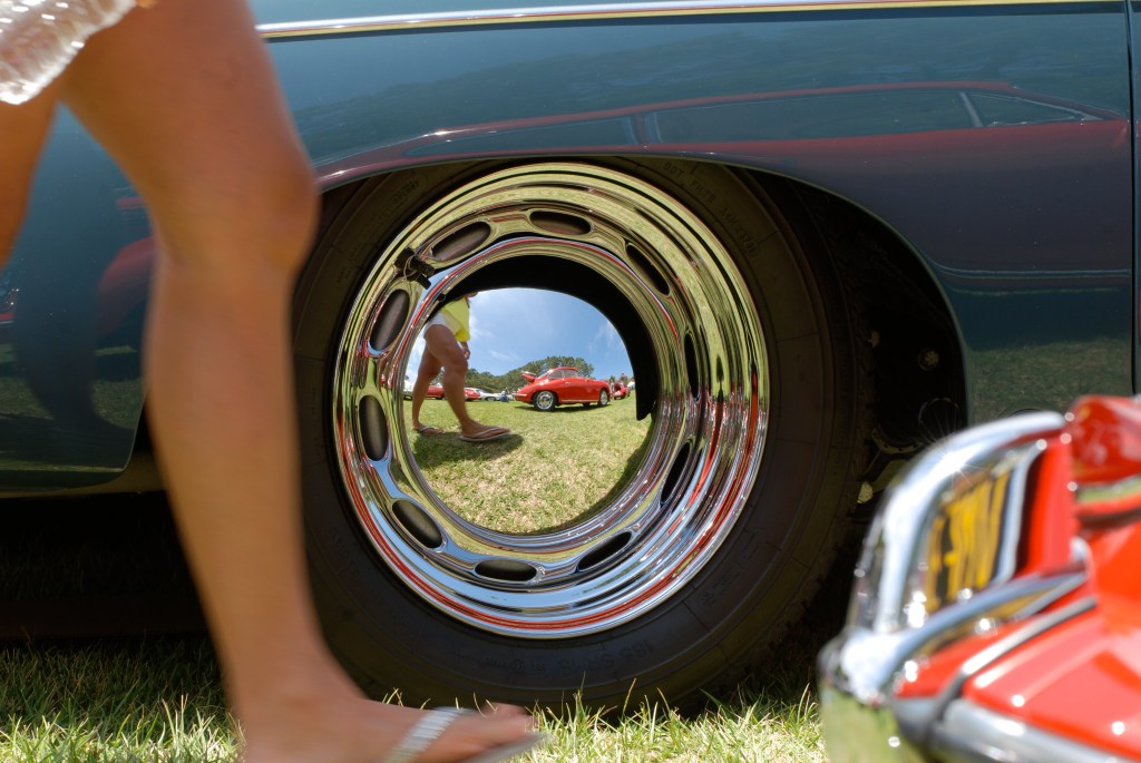356 Registry_  Porsche 356 speedster wheel with reflections_Dana Point concours _July 15, 2012