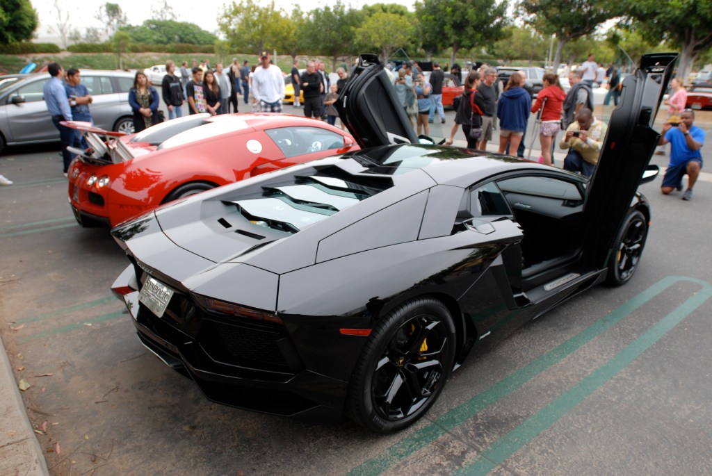 Black Lamborghini Aventador LP 700-4_3/4 rear view with open doors_Cars&Coffee/Irvine_June 23, 2012