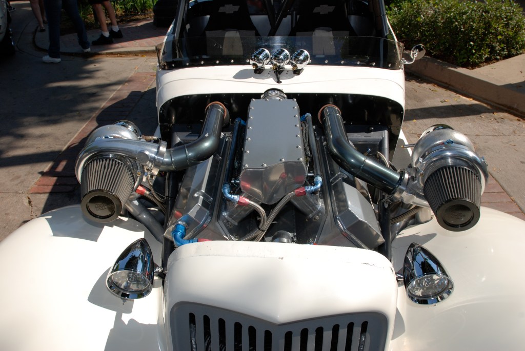 White twin turbocharged roadster_motor/turbo symetry detail_12th Annual Uptown Whittier Car Show_August 18, 2012 White twin turbocharged roadster_motor/turbo symetry detail_12th Annual Uptown Whittier Car Show_August 18, 2012