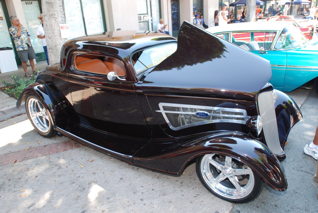 Root beer brown 1934 Ford 3 window coupe_3/4 front view with reflections_ 12th Annual Uptown Whittier Car Show_August 18, 2012 Root beer brown 1934 Ford 3 window coupe_3/4 front view with reflections_ 12th Annual Uptown Whittier Car Show_August 18, 2012