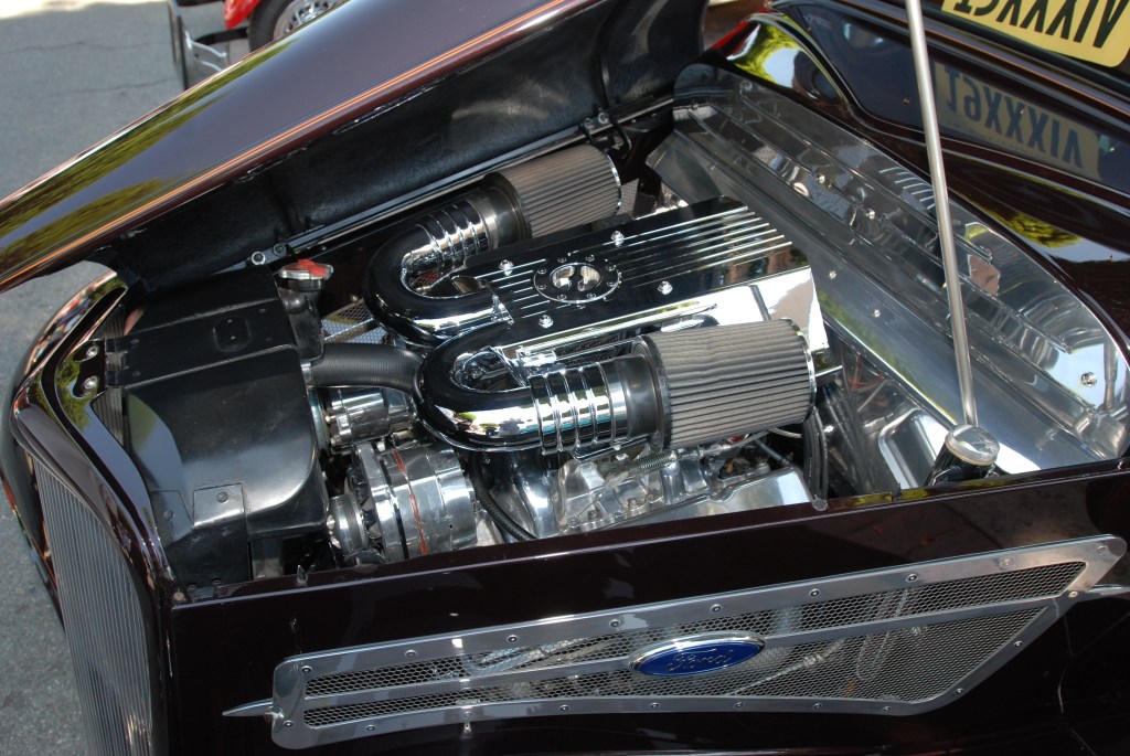 Root beer brown 1934 Ford 3 window coupe_chromed engine, components and firewall_ 12th Annual Uptown Whittier Car Show_August 18, 2012 Root beer brown 1934 Ford 3 window coupe_chromed engine, components and firewall_ 12th Annual Uptown Whittier Car Show_August 18, 2012