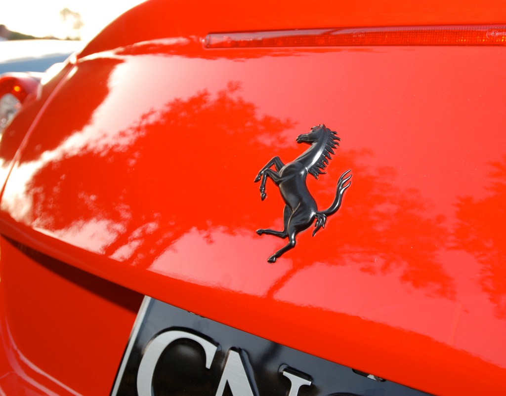 Red Ferrari 599GTO_ Black prancing horse logo on rear trunk _ Cars&Coffee / Irvine_July 28, 2012 Red Ferrari 599GTO_ Black prancing horse logo on rear trunk _ Cars&Coffee / Irvine_July 28, 2012