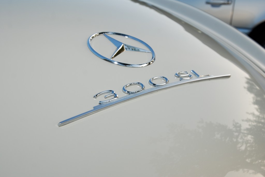 Ivory 1960 Mercedes Benz 300SL roadster_rear trunk badging & reflections_Cars &Coffee/Irvine_July 28, 2012 Ivory 1960 Mercedes Benz 300SL roadster_rear trunk badging & reflections_Cars &Coffee/Irvine_July 28, 2012