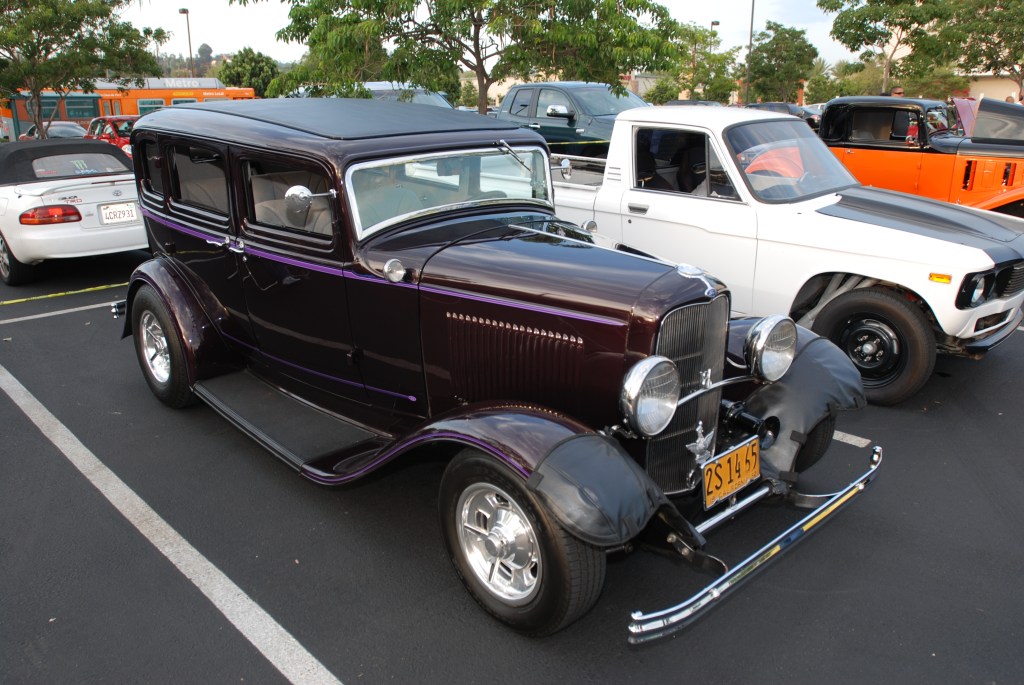 Plum colored 1932 Ford 4 door sedan_3/4 front view_Ruby's Diner car show_ Whittier,California_August 3, 2012 Plum colored 1932 Ford 4 door sedan_3/4 front view_Ruby's Diner car show_ Whittier,California_August 3, 2012
