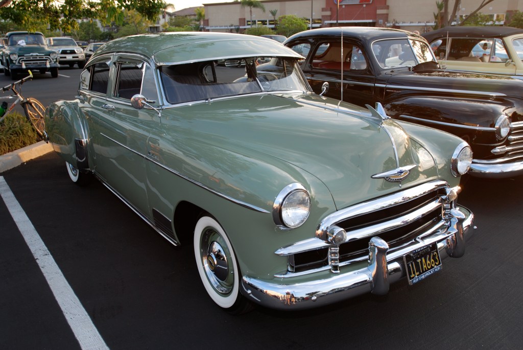 Pale green 1950 Chevrolet Deluxe 4 door sedan_3/4 front view_Ruby's Diner car show_ Whittier,California_August 3, 2012 Pale green 1950 Chevrolet Deluxe 4 door sedan_3/4 front view_Ruby's Diner car show_ Whittier,California_August 3, 2012