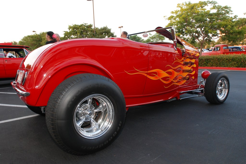 Red 1932 Ford highboy roadster with flames_ 3/4 rear view_Ruby's Diner car show_ Whittier,California_August 3, 2012 Red 1932 Ford highboy roadster with flames_ 3/4 rear view_Ruby's Diner car show_ Whittier,California_August 3, 2012