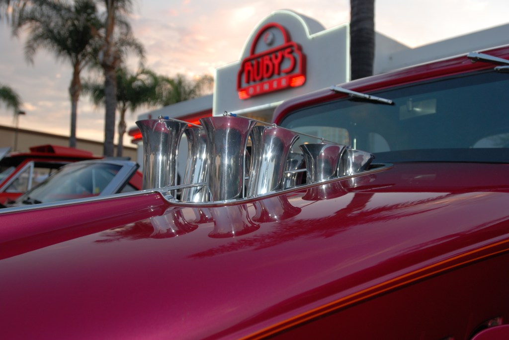 Raspberry colored hot rod_ injection stacks thru hood, reflections & Ruby's diner neon sign_Ruby's Diner car show_ Whittier,California_August 3, 2012