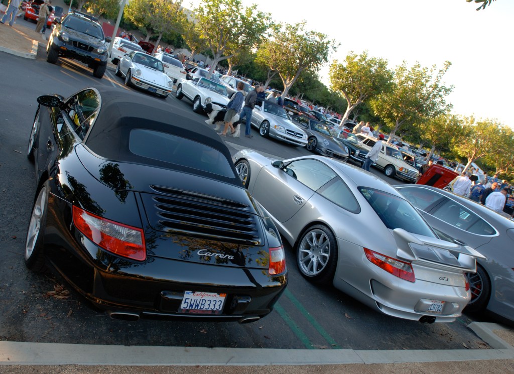 Black Porsche 997 Cabriolet and silver 2008 GT3_3/4 rear w/ reflections_Cars&Coffee_October 27, 2012