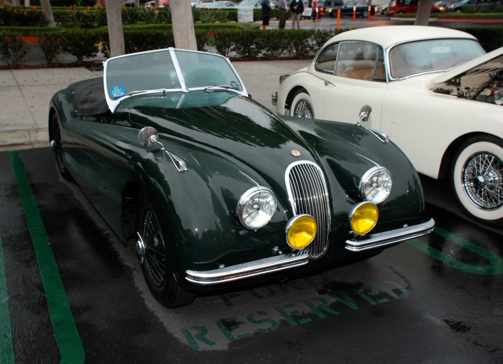 Green Jaguar XK 140 roadster with tonneau & white Xk 150 coupe_in the rain_Cars&Coffee_October 20, 2012