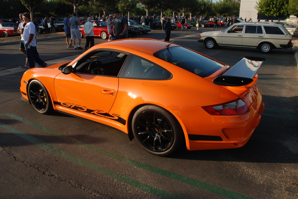 Orange 2007 Porsche GT3RS_3/4 rear view with reflections_Cars&Coffee_November 3, 2012