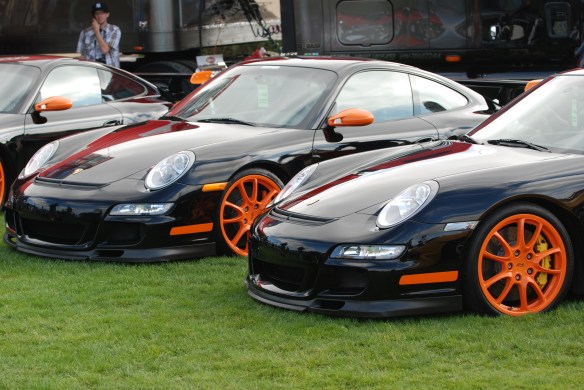 A trio of 2007 Porsche GT3 RS_Black with orange accents_side by side _Rennsport Reunion IV, Laguna Seca A trio of 2007 Porsche GT3 RS_Black with orange accents_side by side _Rennsport Reunion IV, Laguna Seca_DSC_0010_2
