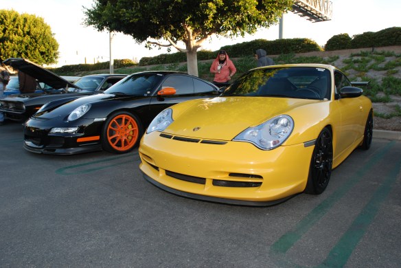 Yellow GT3 and black with orange accents GT3RS_3/4 front views_Cars&Coffee, Irvine Yellow GT3 and black with orange accents GT3RS_3/4 front views_Cars&Coffee, Irvine_DSC_0141
