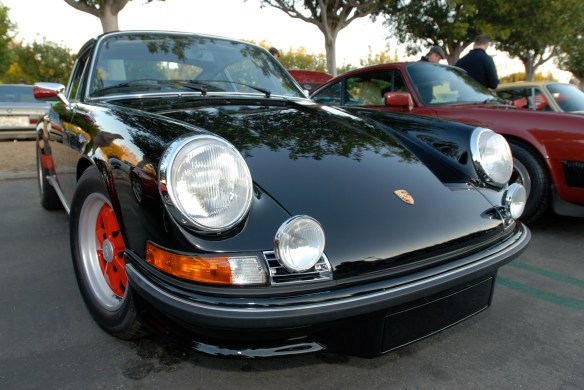 Black 1973 Porsche 911 Carrera RS_right hand drive model_3/4 front view with reflections_Cars&Coffee/Irvine_January 5. 2013