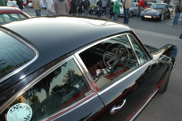 Black 1973 Porsche 911 Carrera RS_right hand drive model_3/4 side view with reflections_Cars&Coffee/Irvine_January 5. 2013