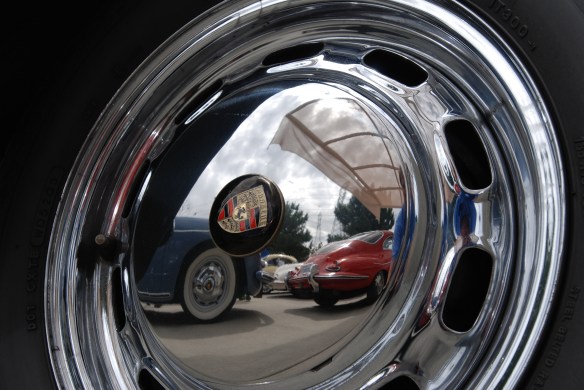 Blue and Red Porsche 356 reflections in hubcap of 356_Phoenix club all Porsche Swap & Display_3/03/13