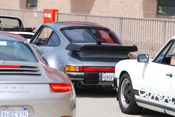 50th anniversary  of the Porsche 911 display_1984 930 Turbo & friends on pit row_California Festival of Speed_April 6, 2013