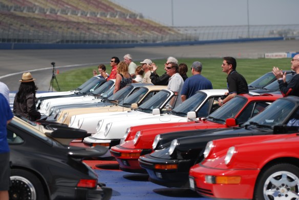 50th anniversary  of the Porsche 911 display_911s and owners staged for group photo_California Festival of Speed_April 6, 2013