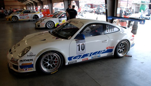 White & blue striped TruSpeed Porsche GT3 cup car #10_garage 2_California Festival of Speed_April 6, 2013