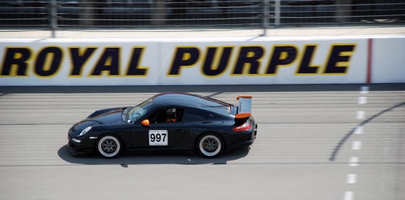 Black Porsche 997 GT3 RS #997 at speed_pan shot _California Festival of Speed_April 6, 2013
