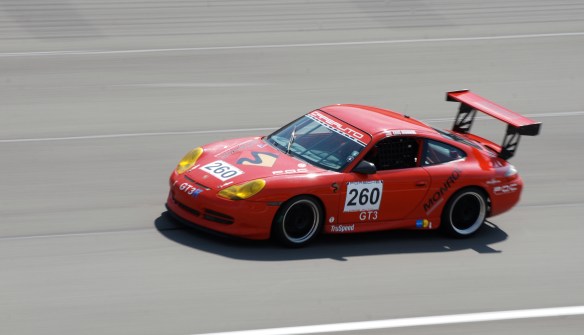 Red Porsche 996 Monroe Consulting Koni cup car#260_pan shot _California Festival of Speed_April 6, 2013