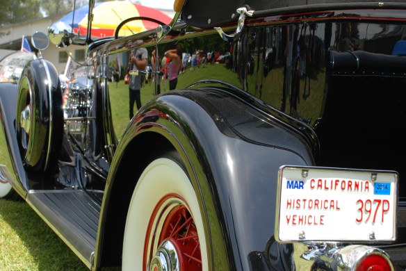 Black 1934 Packard Super 8 Dual Cowl Phaeton_3/4 side view, reflections_Boys Republic / Steve McQueen car&motorcycle show _June 1, 2013