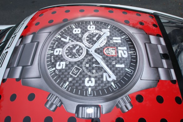 2013 Pikes Peak participant_Porsche GT3 cup car driven by Jeff Zwart_roof shot with Luminox watch graphic_cars&coffee_July 6, 2013