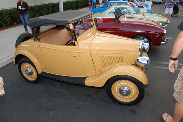 1935 Datsun 14 roadster (#002)yellow_3/4 side view _Cars&Coffee_August 31, 2013
