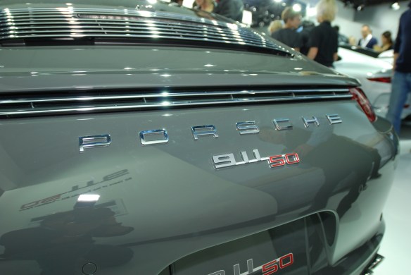2014 50th Anniversary Edition Porsche 991_ rear view, detail of 911 50th anniversary logo_LA Auto show_November 23, 2013 2014 50th Anniversary Edition Porsche 991_ rear view, detail of 911 50th anniversary logo_LA Auto show_November 23, 2013
