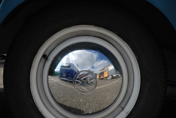 Hubcap reflection_straight on view , blue & white bus reflected_OCTO Winter meet_Long Beach , CA_February 8, 2014 Hubcap reflection_straight on view , blue & white bus reflected_OCTO Winter meet_Long Beach , CA_February 8, 2014