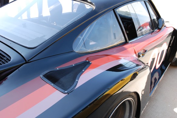 TruSpeeds restored,1978 Interscope racing Porsche 935 twin turbo_3/4 rear view with top of fender reflections _California Festival of Speed_4/5/14