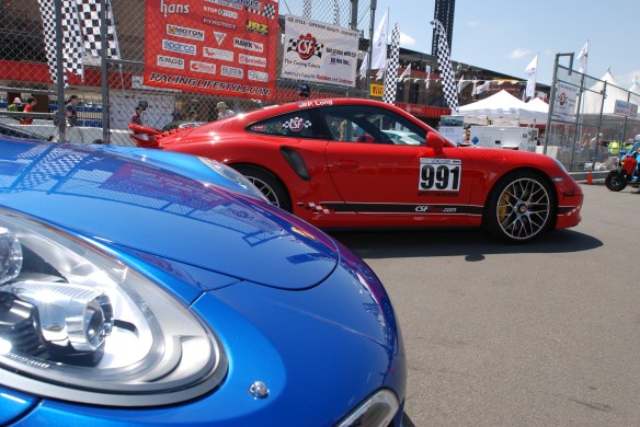2014 Sapphire Blue metallic Porsche 991 Turbo S _nose view on pit row_California Festival of Speed_4/5/14
