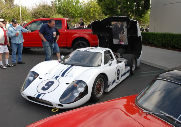 White 1967 Ford GT MK IV_3/4front view with red speedster in foreground_cars&coffee/irvine_May 10, 2014