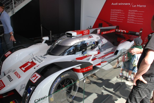 Audi Boutique at La Chapelle_2014 Audi R-18 e-tron on display_3/4 side view_Le Mans24_June 14, 2014