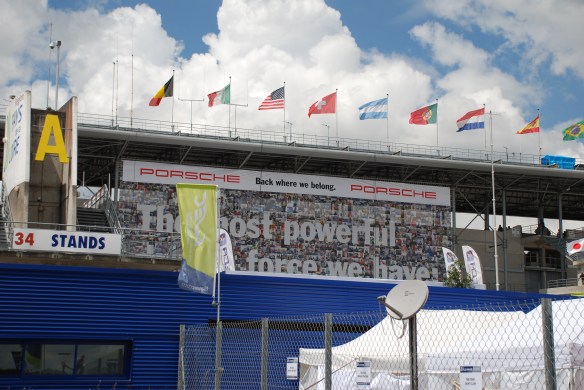 Porsche supergraphics_the most powerful..._pit row grandstands_Le Mans24_June 14, 2014