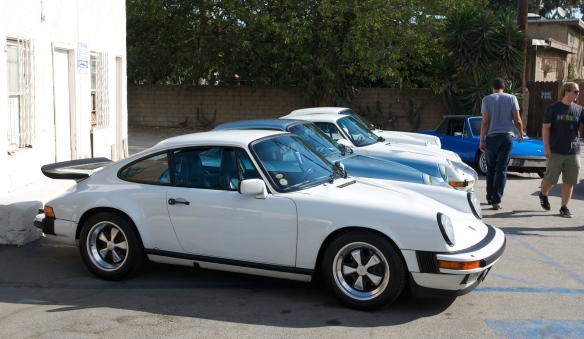 Porsche evolution row_1986 911 Carrera, Blue 911SC, white 993 Turbo, white 964 coupe_3/4 side view_ Luftgekuhlt event_Sunday September 7, 2014