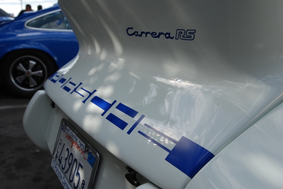 white with blue accents_1973 Porsche 911 Carrera RS_rear ducktail spoiler detail shot_ Luftgekuhlt event_Sunday September 7, 2014